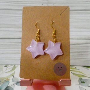Purple star fish hook earrings.